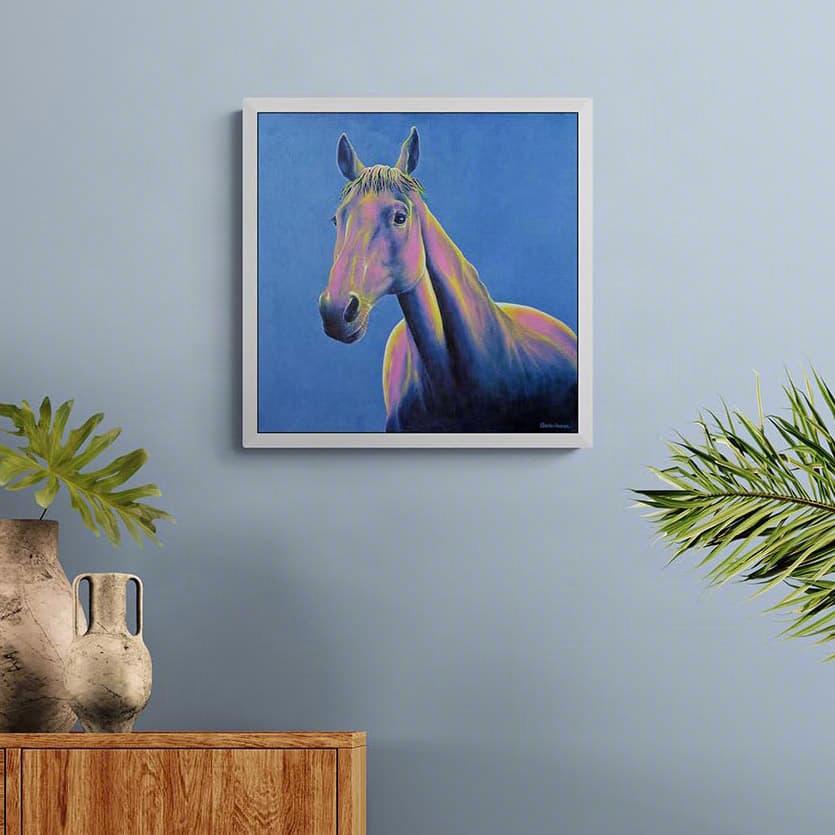 Colourful horse painting in a living room with a cabinet and folding stool